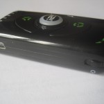 The mini-USB is for charging the i2i Stream's battery, and the top corner has the combined power button and volume control